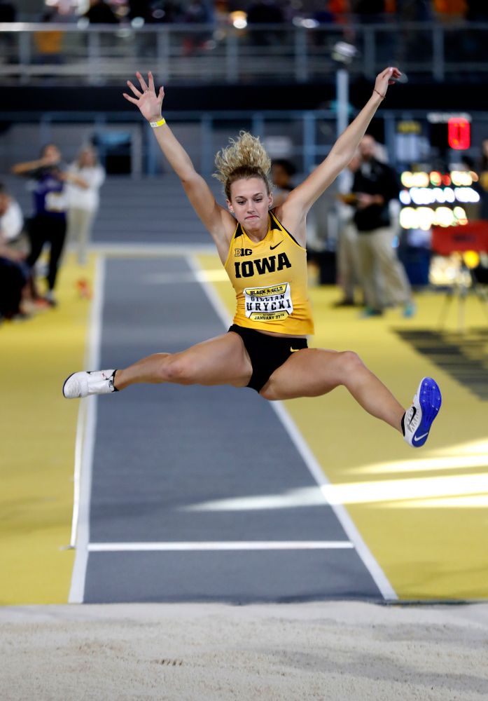 Gillian Urycki competes in the long jump 