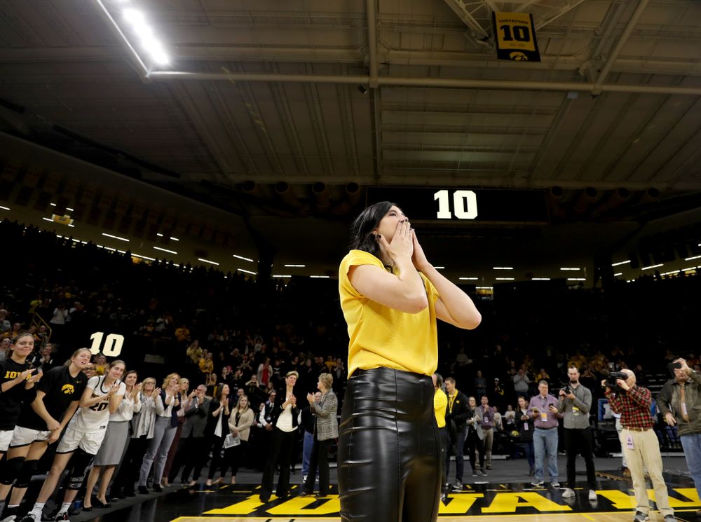 Megan Gustafson blows a kiss to the fans after her number was raised into the rafters during a jersey retirement ceremony Sunday, January 26, 2020 at Carver-Hawkeye Arena. (Brian Ray/hawkeyesports.com)