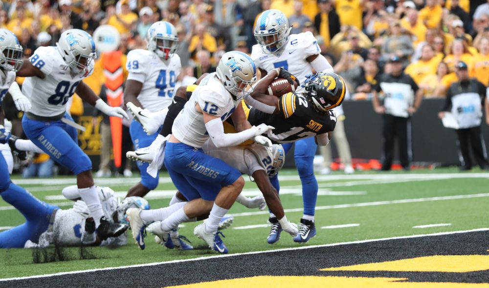 Iowa Hawkeyes wide receiver Brandon Smith (12) scores against Middle Tennessee State Saturday, September 28, 2019 at Kinnick Stadium. (Max Allen/hawkeyesports.com)