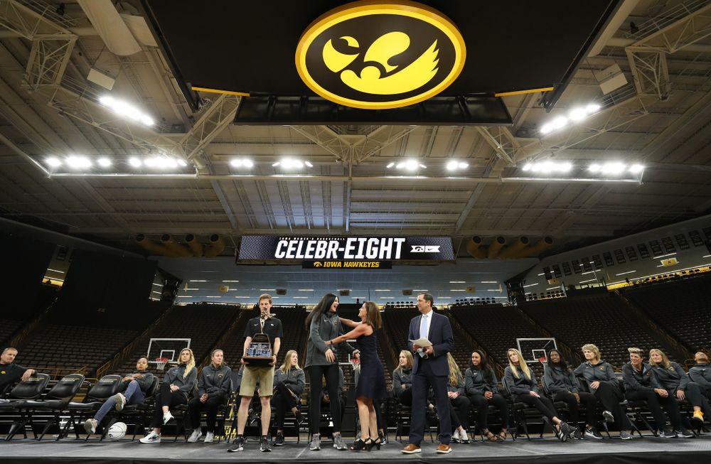 Iowa Hawkeyes forward Megan Gustafson (10) is presented with the Naismith Player Of The Year Trophy during the teamÕs Celebr-Eight event Wednesday, April 24, 2019 at Carver-Hawkeye Arena. (Brian Ray/hawkeyesports.com)