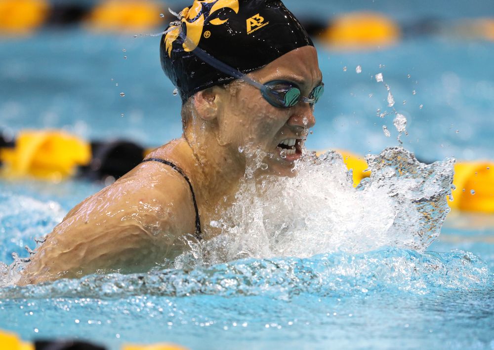 Iowa's Devin Jacobs swims the 100 yard breaststroke during a double dual against Wisconsin and Northwestern Saturday, January 19, 2019 at the Campus Recreation and Wellness Center. (Brian Ray/hawkeyesports.com)