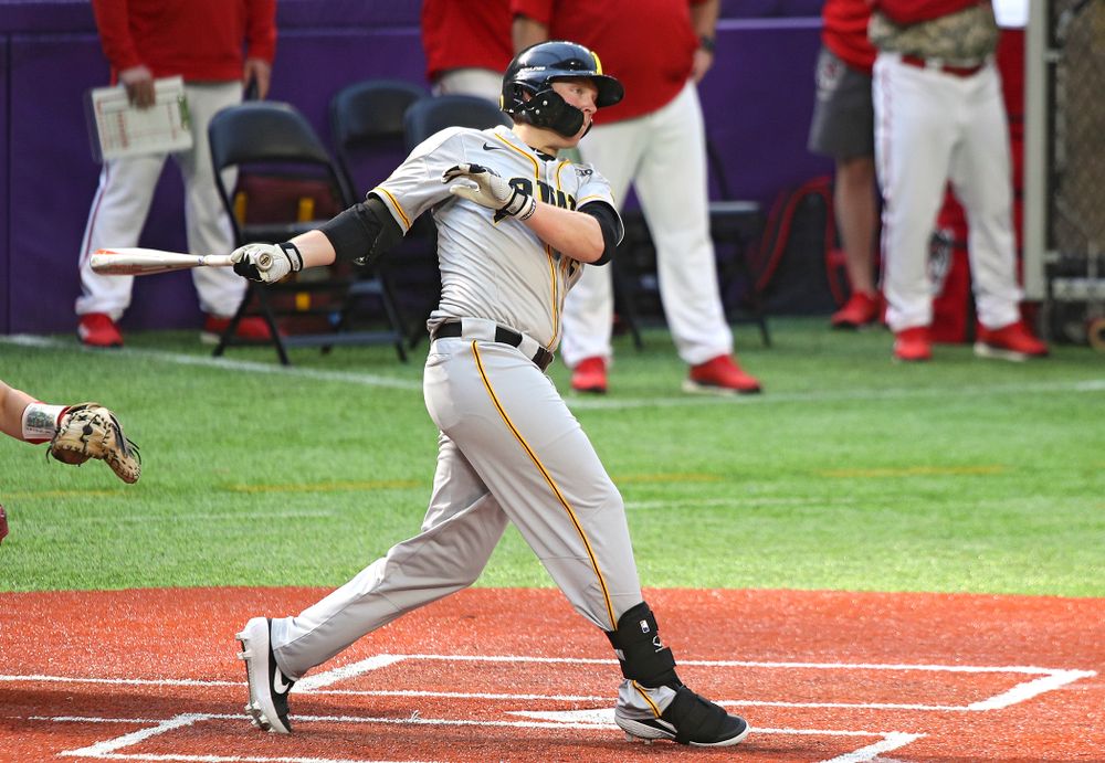 Iowa Hawkeyes outfielder Zeb Adreon (5) drives a pitch for a hit during the seventh inning of their CambriaCollegeClassic game at U.S. Bank Stadium in Minneapolis, Minn. on Friday, February 28, 2020. (Stephen Mally/hawkeyesports.com)