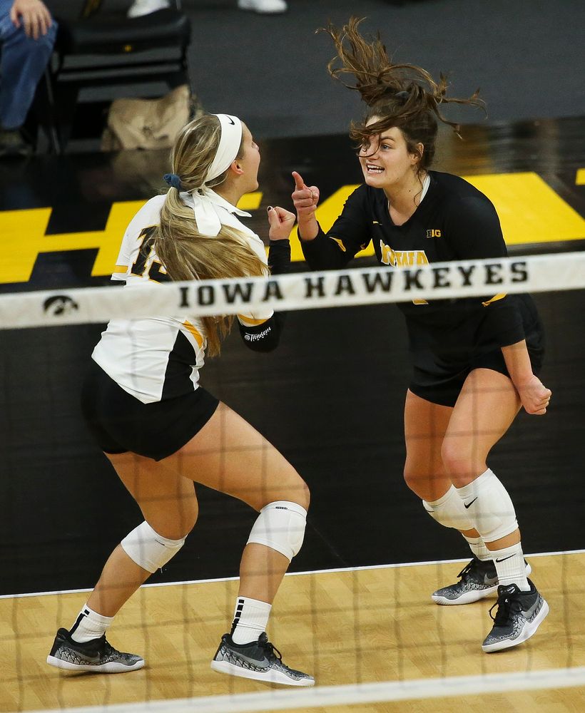 Iowa Hawkeyes defensive specialist Maddie Slagle (15) and Iowa Hawkeyes defensive specialist Molly Kelly (1) react after an attack goes long during a game against Purdue at Carver-Hawkeye Arena on October 13, 2018. (Tork Mason/hawkeyesports.com)