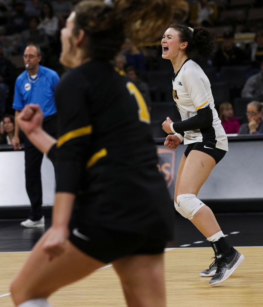 Iowa Hawkeyes defensive specialist Halle Johnston (4) celebrates after winning a point during a match against Rutgers at Carver-Hawkeye Arena on November 2, 2018. (Tork Mason/hawkeyesports.com)