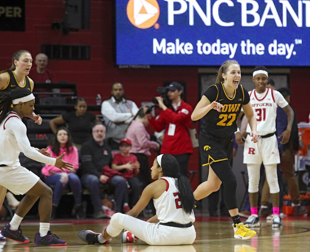 Iowa guard Kathleen Doyle (22) celebrates after a hold in the final seconds of the fourth quarter of their game at the Rutgers Athletic Center in Piscataway, N.J. on Sunday, March 1, 2020. (Stephen Mally/hawkeyesports.com)
