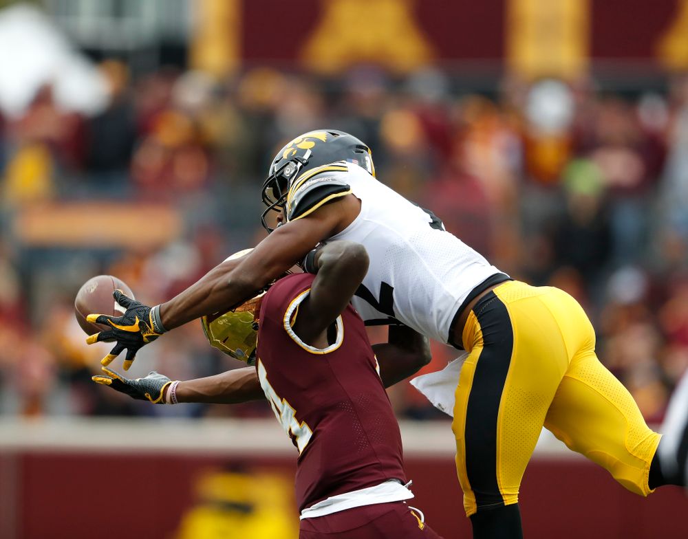 Iowa Hawkeyes wide receiver Brandon Smith (12) makes a catch against the Minnesota Golden Gophers Saturday, October 6, 2018 at TCF Bank Stadium. (Brian Ray/hawkeyesports.com)