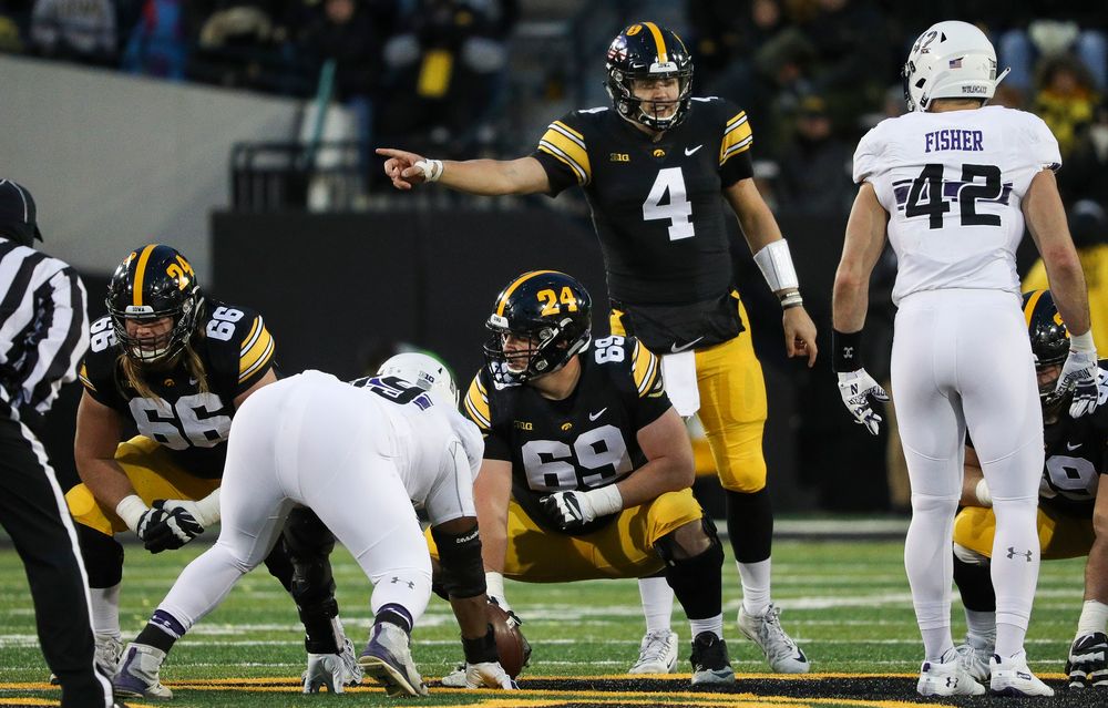 Iowa Hawkeyes quarterback Nate Stanley (4) calls out signals before the snap during a game against Northwestern at Kinnick Stadium on November 10, 2018. (Tork Mason/hawkeyesports.com)