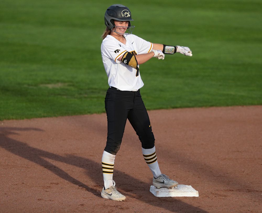 Iowa second baseman Aralee Bogar (2) dances on second base after hitting a double during the fifth inning of their game against Ohio State at Pearl Field in Iowa City on Friday, May. 3, 2019. (Stephen Mally/hawkeyesports.com)