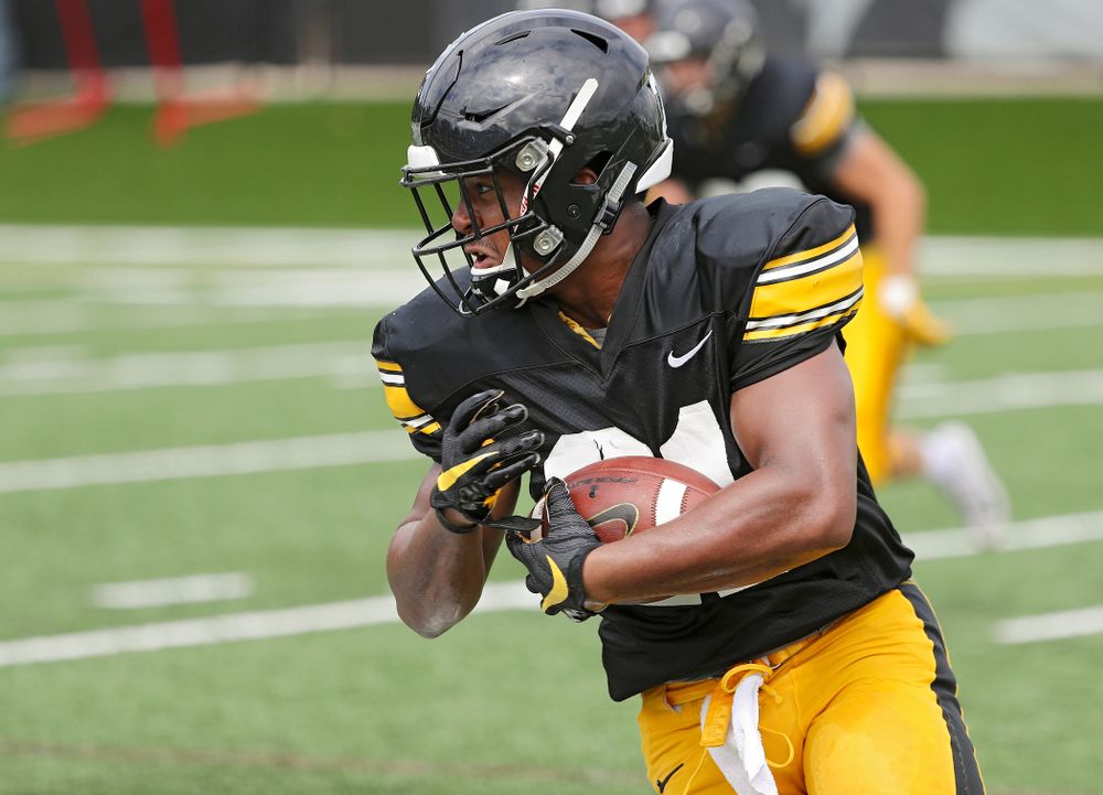 Iowa Hawkeyes running back Ivory Kelly-Martin (21) runs after pulling in a pass during Fall Camp Practice No. 10 at the Hansen Football Performance Center in Iowa City on Tuesday, Aug 13, 2019. (Stephen Mally/hawkeyesports.com)