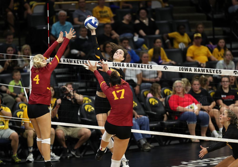 Iowa Hawkeyes setter Courtney Buzzerio (2) goes up to hit the ball against the Iowa State Cyclones Saturday, September 21, 2019 during the Iowa Corn Cy-Hawk Series Tournament at Carver-Hawkeye Arena. (Brian Ray/hawkeyesports.com)