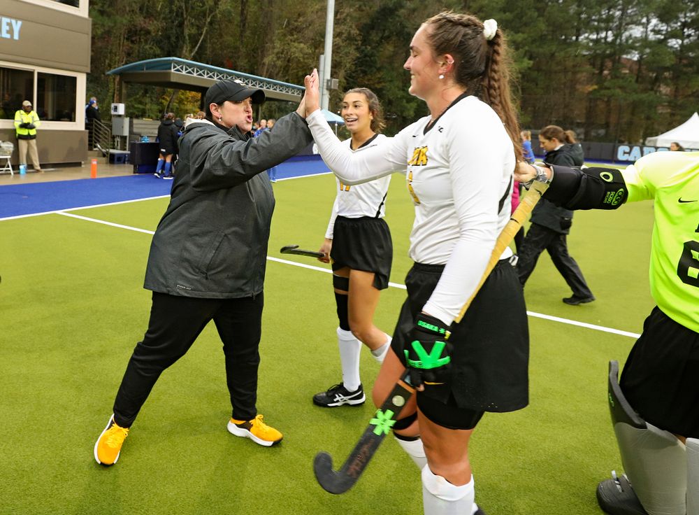 Iowa head coach Lisa Cellucci gives a high-five to Anthe Nijziel (6) after winning their NCAA Tournament First Round match against Duke at Karen Shelton Stadium in Chapel Hill, N.C. on Friday, Nov 15, 2019. (Stephen Mally/hawkeyesports.com)