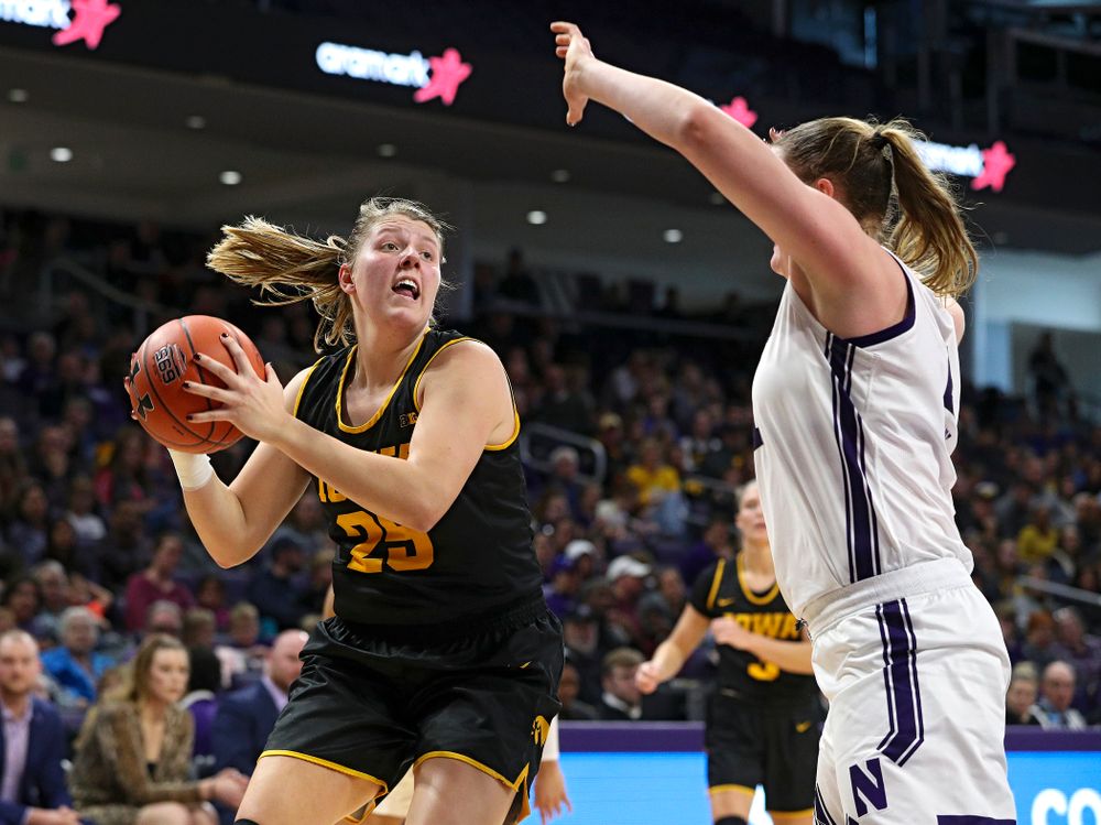 Iowa Hawkeyes forward Monika Czinano (25) looks to shoot during the second quarter of their game at Welsh-Ryan Arena in Evanston, Ill. on Sunday, January 5, 2020. (Stephen Mally/hawkeyesports.com)