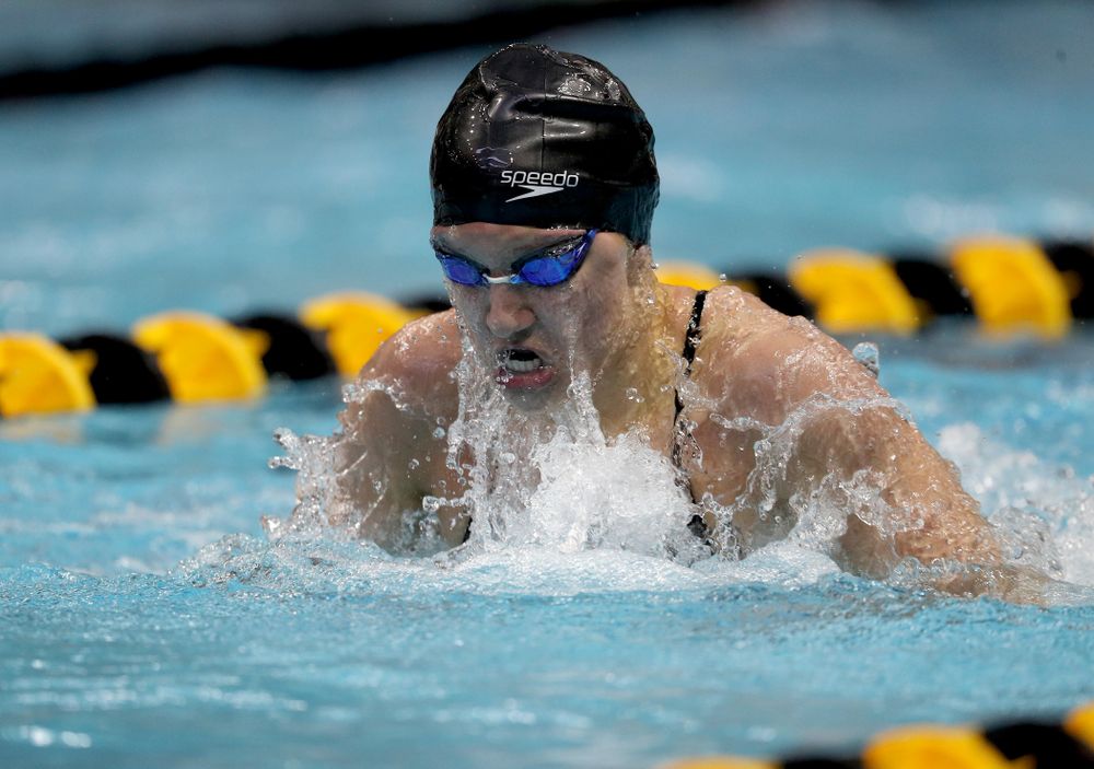 IowaÕs Sage Ohlensehlen competes in the 100 yard breaststroke against Notre Dame and Illinois Saturday, January 11, 2020 at the Campus Recreation and Wellness Center.  (Brian Ray/hawkeyesports.com)