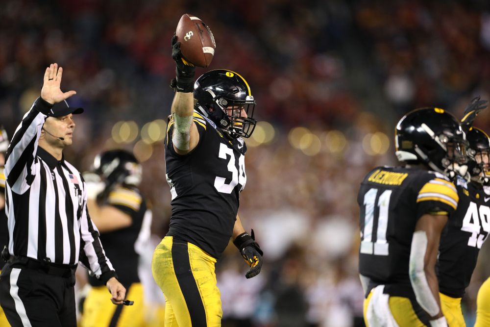 Iowa Hawkeyes linebacker Kristian Welch (34) celebrates after recovering a fumble against USC in the Holiday Bowl Friday, December 27, 2019 at San Diego Community Credit Union Stadium.  (Brian Ray/hawkeyesports.com)