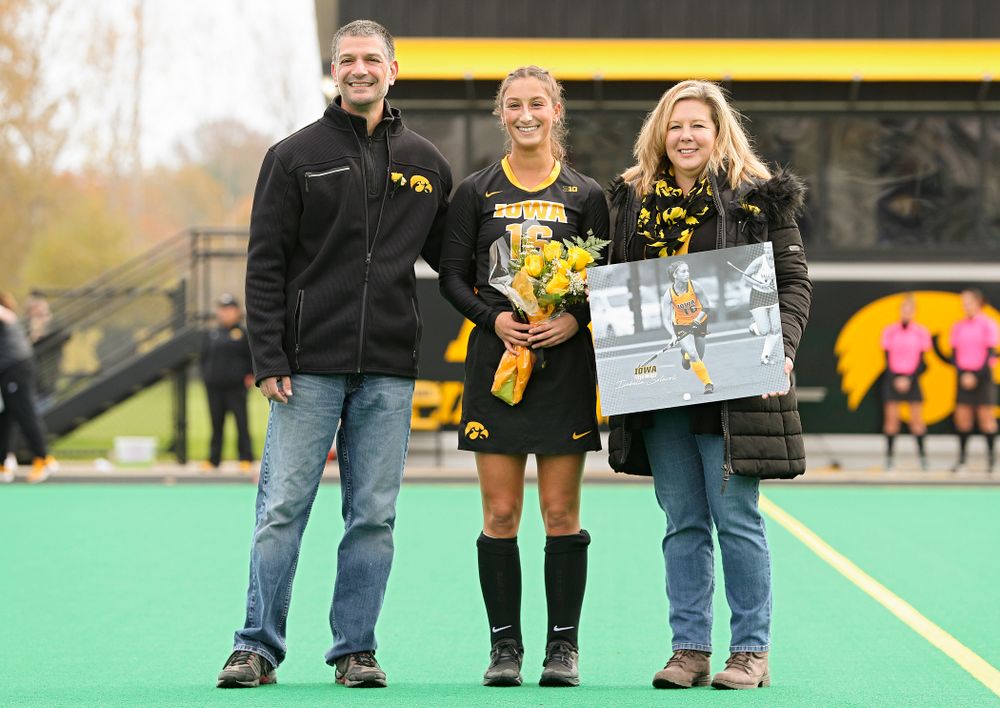 Iowa’s Isabella Solaroli (16) in honored with her parents on Senior Day before their game at Grant Field in Iowa City on Saturday, Oct 26, 2019. (Stephen Mally/hawkeyesports.com)