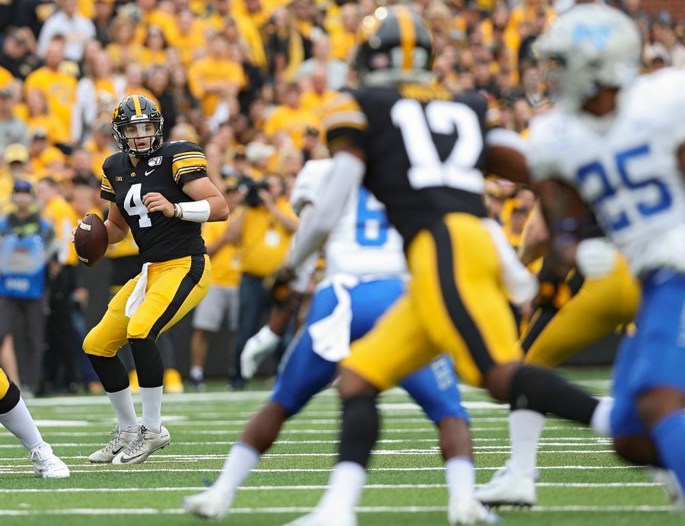 Iowa Hawkeyes quarterback Nate Stanley (4) looks to pass during the first quarter of their game at Kinnick Stadium in Iowa City on Saturday, Sep 28, 2019. (Stephen Mally/hawkeyesports.com)