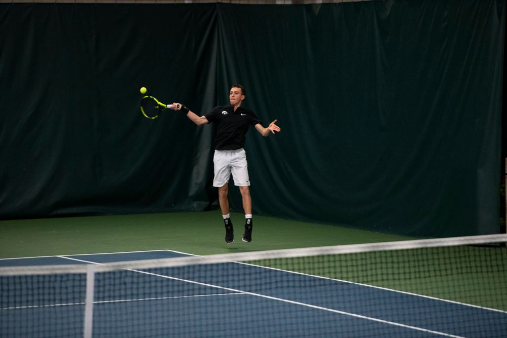 The Iowa men's tennis team competes against Cornell in The Rise Tennis Center in Ithaca, NY on Sunday, Feb. 24, 2019. 
