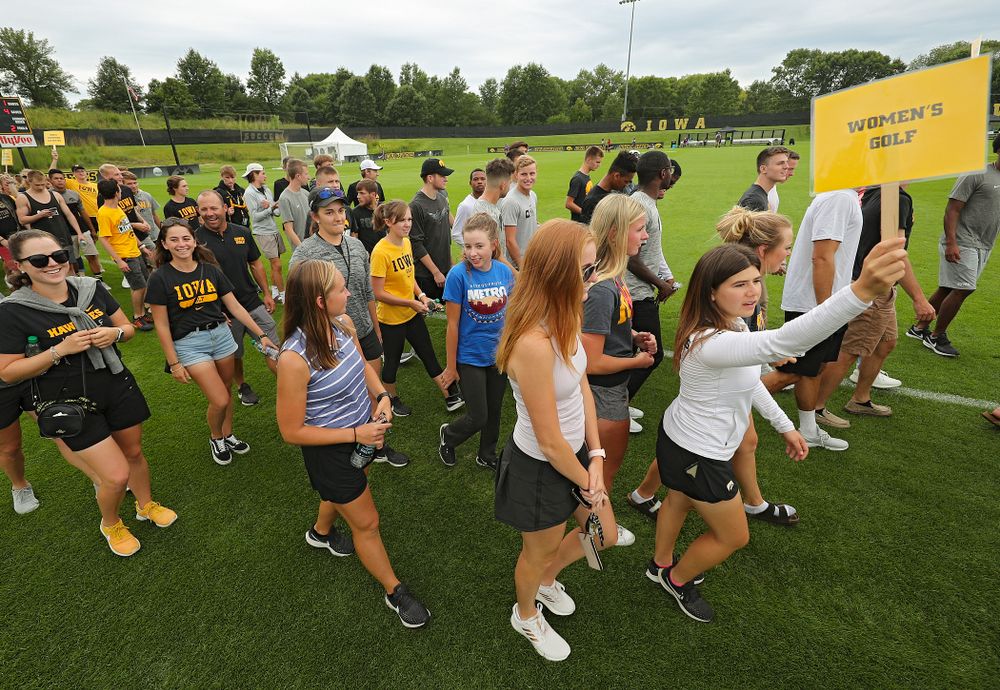 Student-athletes walk in the Parade of Champions during the Student-Athlete Kickoff at the Iowa Soccer Complex in Iowa City on Sunday, Aug 25, 2019. (Stephen Mally/hawkeyesports.com)