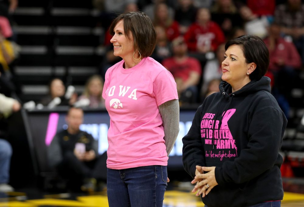 Women affected by cancer are introduced during the Iowa Hawkeyes game against the Wisconsin Badgers Sunday, February 16, 2020 at Carver-Hawkeye Arena. (Brian Ray/hawkeyesports.com)