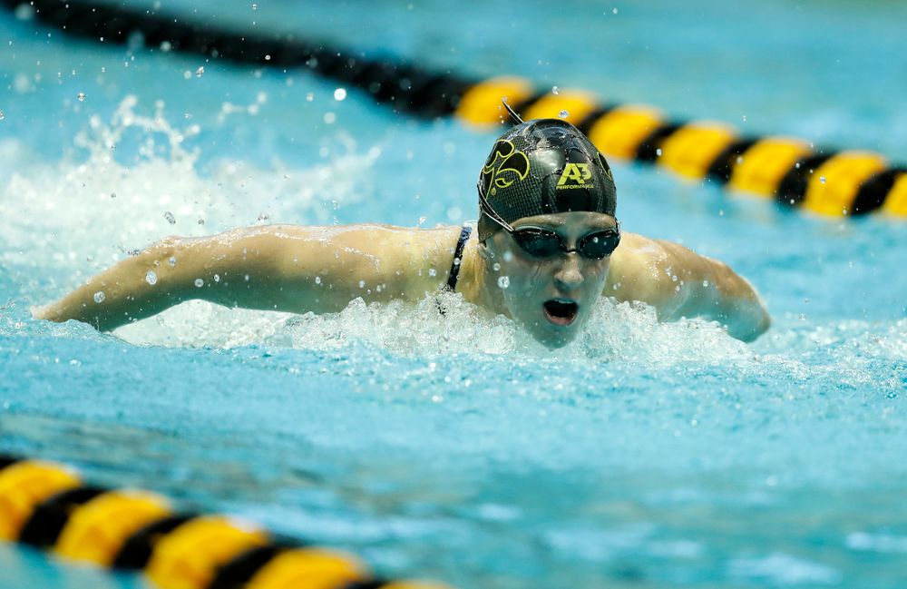 Kelly McNamara swims the 100 yard butterfly 