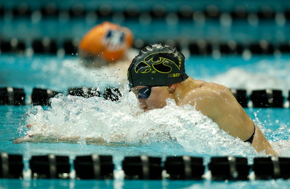 Iowa's Sage Ohlensehlen swims the 100 yard breaststroke 
