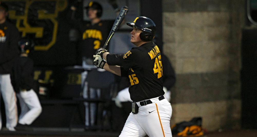 Iowa first baseman Peyton Williams (45) hits a triple during the sixth inning of their game at Duane Banks Field in Iowa City on Tuesday, March 3, 2020. (Stephen Mally/hawkeyesports.com)