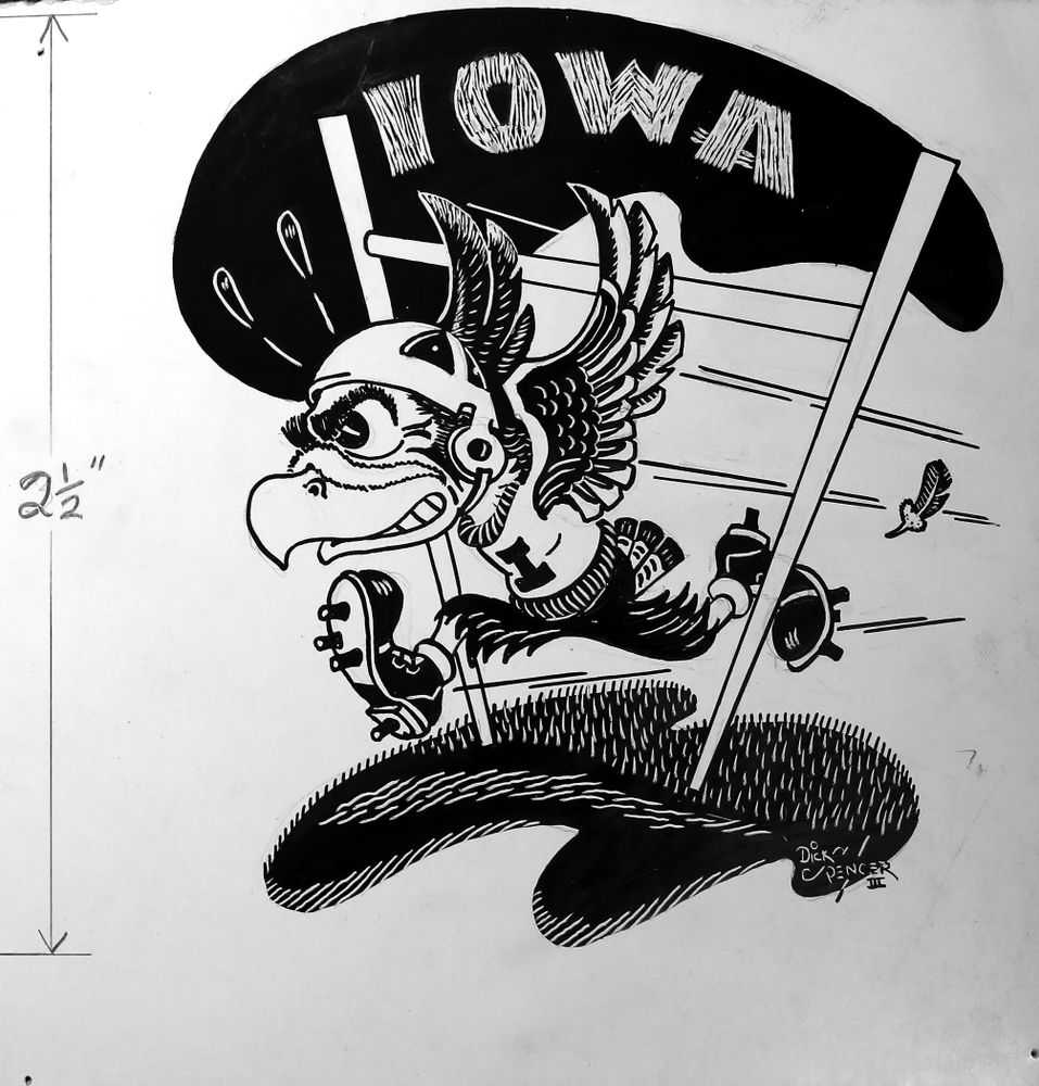 Jane Roth sits with some of the original drawings of Herky the Hawk Friday, April 20, 2018 at the University of Iowa Library. Roth has donated the drawings, which were created by artist Dick Spencer, to the library's special collection. (Brian Ray/hawkeyesports.com)