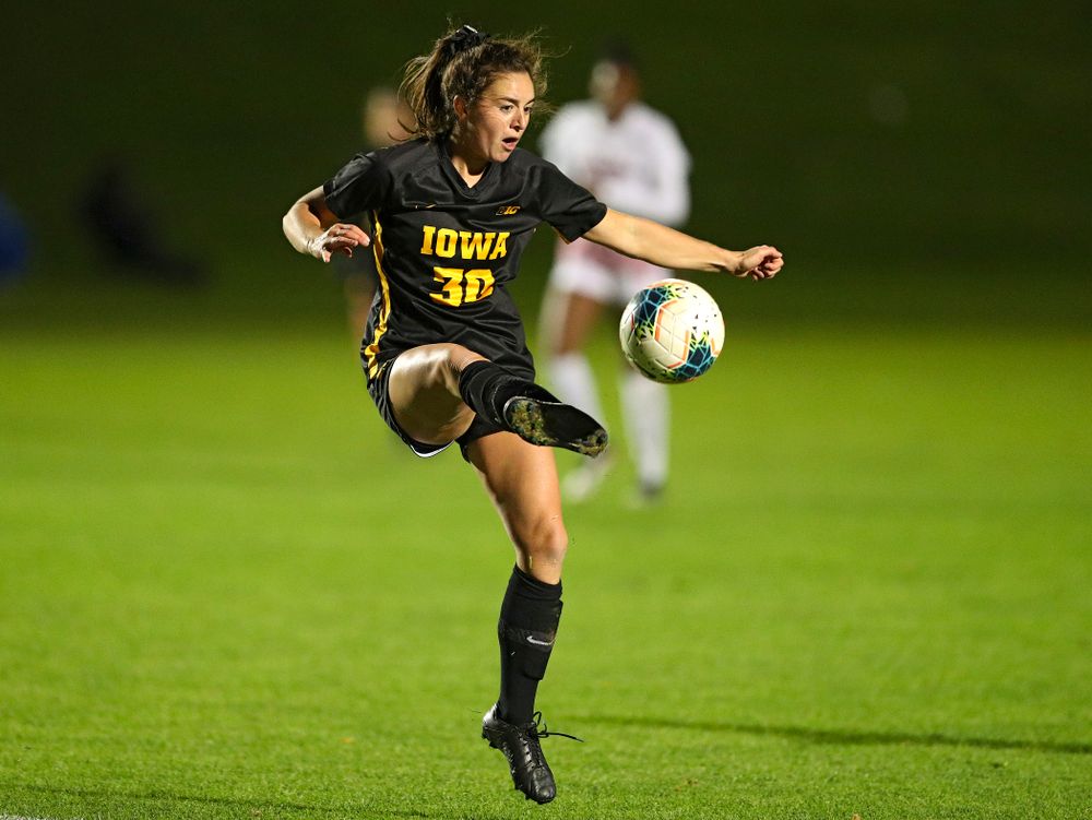 Iowa forward Devin Burns (30) passes the ball during the second half of their match at the Iowa Soccer Complex in Iowa City on Friday, Oct 11, 2019. (Stephen Mally/hawkeyesports.com)