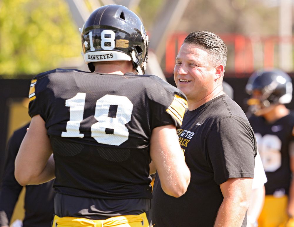 Iowa Hawkeyes tight end Drew Cook (18) talks with offensive coordinator Brian Ferentz during Fall Camp Practice #5 at the Hansen Football Performance Center in Iowa City on Tuesday, Aug 6, 2019. (Stephen Mally/hawkeyesports.com)