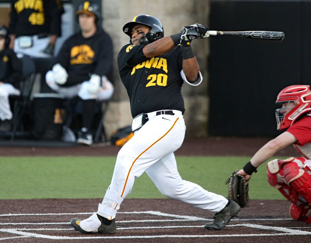 Iowa infielder Izaya Fullard (20) gets a hit during the fifth inning of their game at Duane Banks Field in Iowa City on Tuesday, March 3, 2020. (Stephen Mally/hawkeyesports.com)