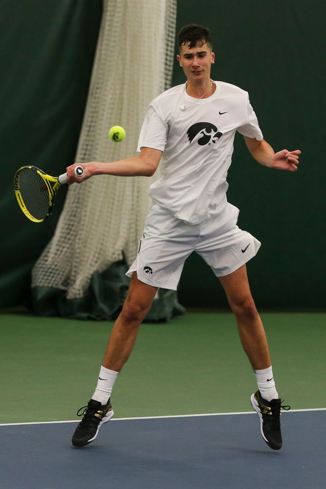 Iowa’s Matt Clegg hits a forehand during the Iowa men’s tennis match vs Western Michigan on Saturday, January 18, 2020 at the Hawkeye Tennis and Recreation Complex. (Lily Smith/hawkeyesports.com)