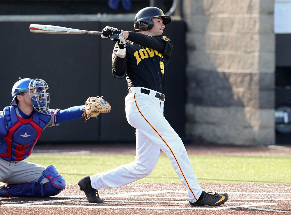 Iowa outfielder Ben Norman (9) drives a pitch for a hit during the first inning of their college baseball game at Duane Banks Field in Iowa City on Tuesday, March 10, 2020. (Stephen Mally/hawkeyesports.com)
