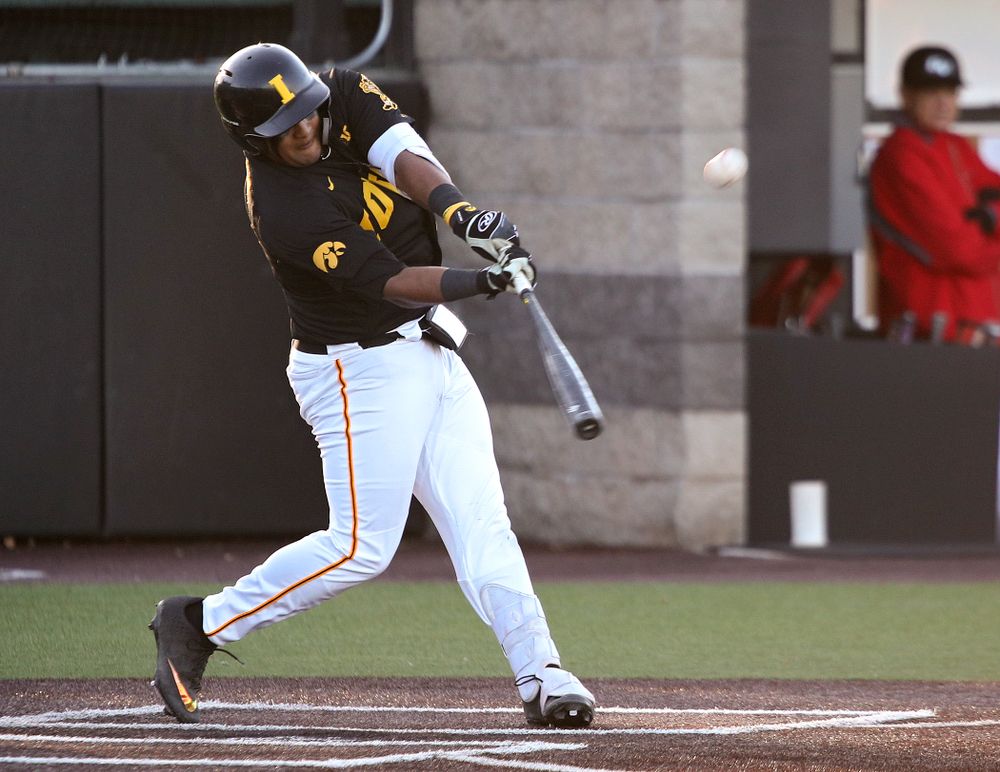 Iowa infielder Izaya Fullard (20) hits a triple during the third inning of their game at Duane Banks Field in Iowa City on Tuesday, March 3, 2020. (Stephen Mally/hawkeyesports.com)