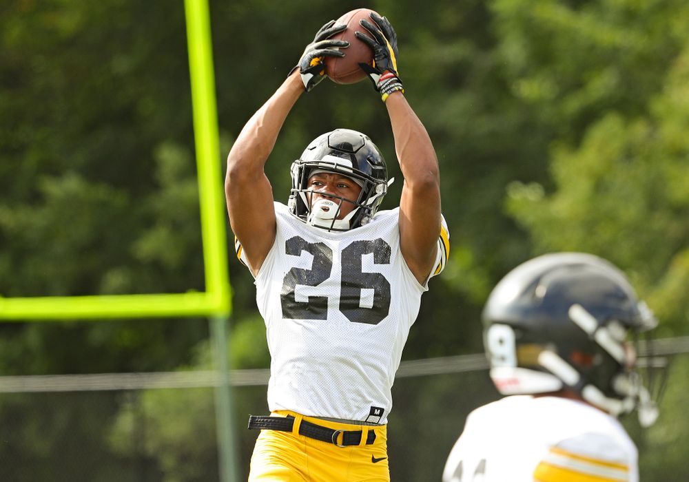 Iowa Hawkeyes defensive back Kaevon Merriweather (26) pulls in a pass in a drill during Fall Camp Practice No. 11 at the Hansen Football Performance Center in Iowa City on Wednesday, Aug 14, 2019. (Stephen Mally/hawkeyesports.com)