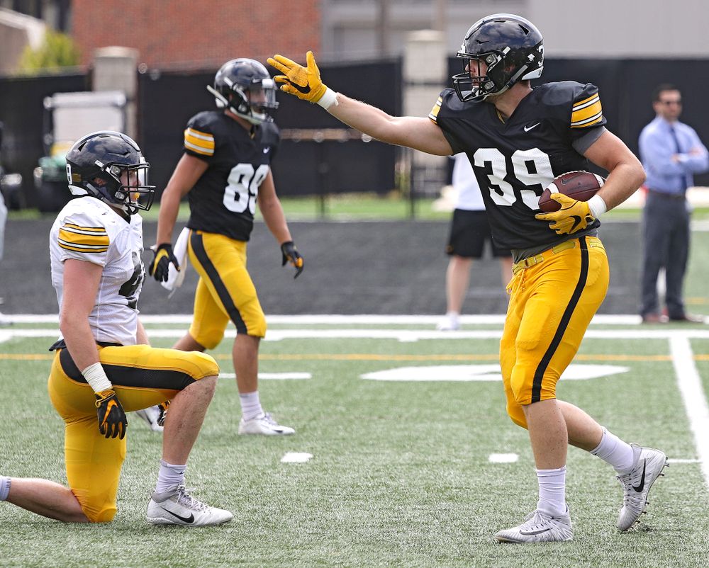 Iowa Hawkeyes tight end Nate Wieting (39) signals first down after pulling in a pass during Fall Camp Practice No. 11 at the Hansen Football Performance Center in Iowa City on Wednesday, Aug 14, 2019. (Stephen Mally/hawkeyesports.com)