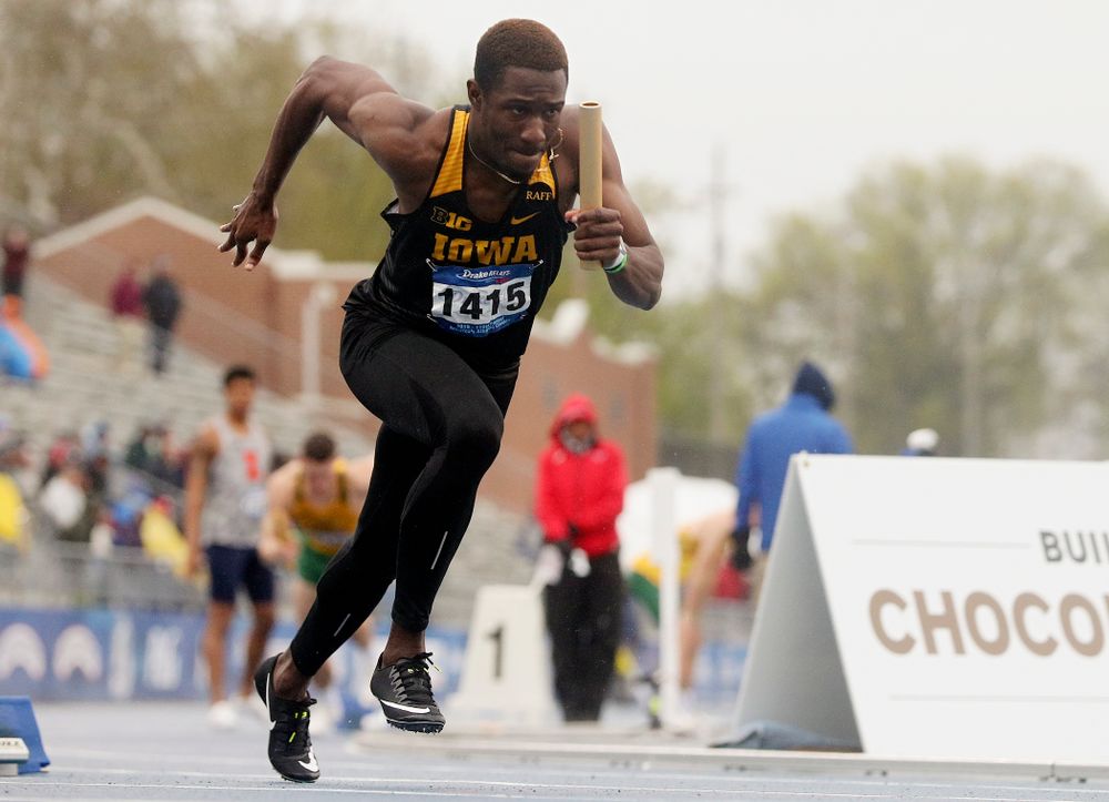 Iowa's Karayme Bartley runs the men's sprint medley relay event during the third day of the Drake Relays at Drake Stadium in Des Moines on Saturday, Apr. 27, 2019. (Stephen Mally/hawkeyesports.com)