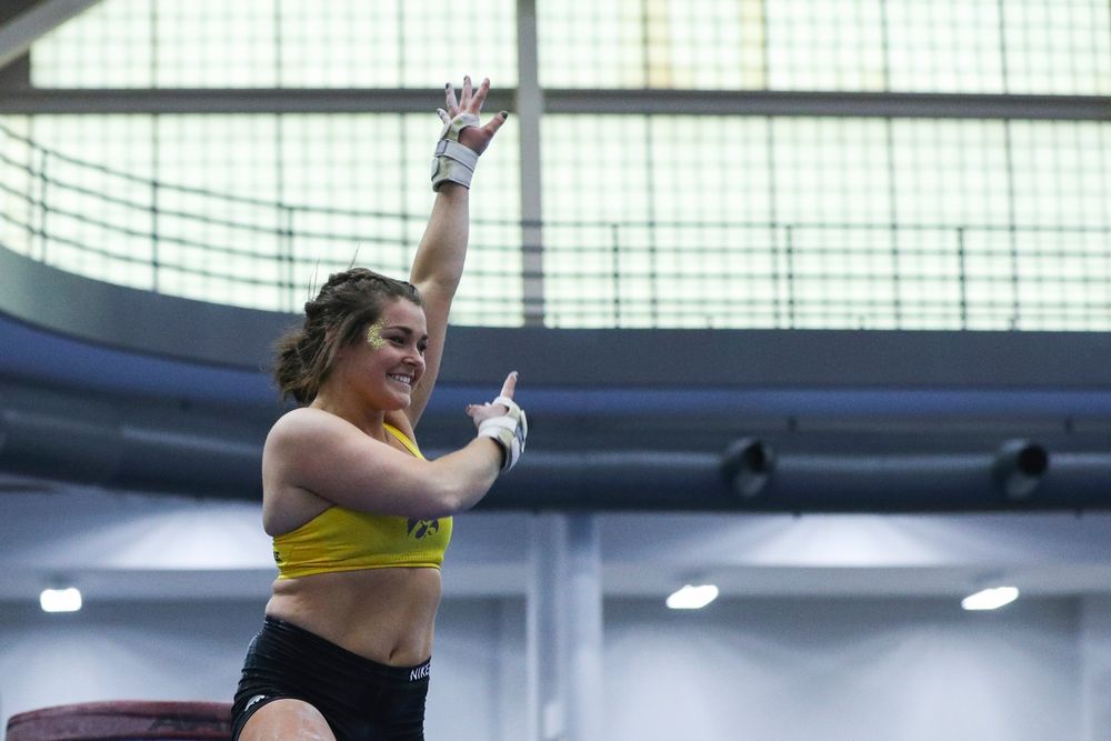 Erin Castle dismounts from the vault during the Iowa women’s gymnastics Black and Gold Intraquad Meet on Saturday, December 7, 2019 at the UI Field House. (Lily Smith/hawkeyesports.com)