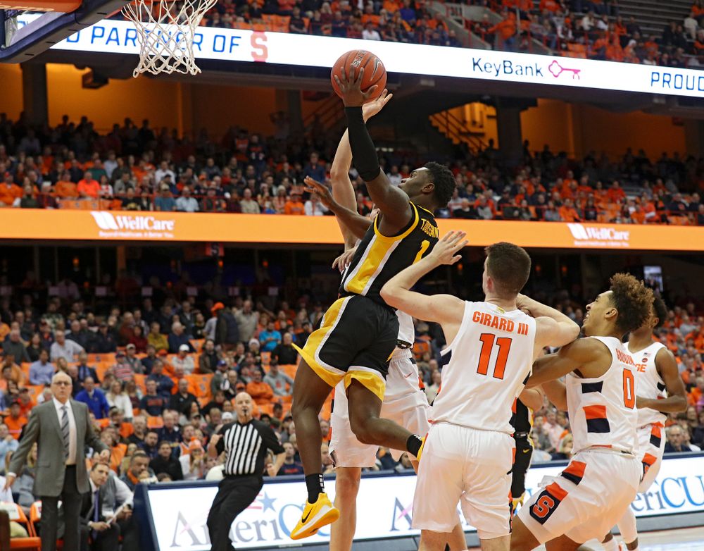 Iowa Hawkeyes guard Joe Toussaint (1) puts up a shot during the first half of their ACC/Big Ten Challenge game at the Carrier Dome in Syracuse, N.Y. on Tuesday, Dec 3, 2019. (Stephen Mally/hawkeyesports.com)