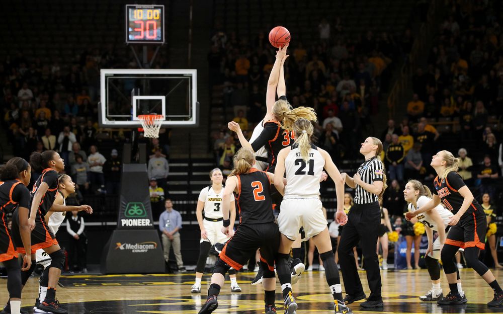 Iowa Hawkeyes forward Megan Gustafson (10) wins the opening tip during the first round of the 2019 NCAA Women's Basketball Tournament at Carver Hawkeye Arena in Iowa City on Friday, Mar. 22, 2019. (Stephen Mally for hawkeyesports.com)