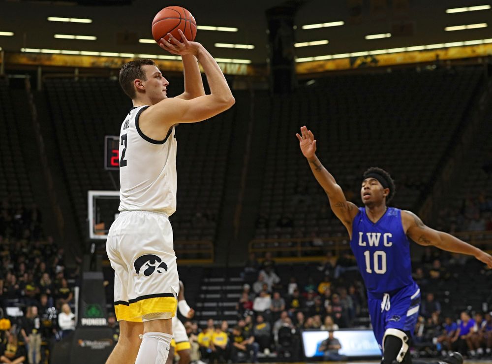 Iowa Hawkeyes forward Jack Nunge (2) puts up a shot during the second half of their exhibition game against Lindsey Wilson College at Carver-Hawkeye Arena in Iowa City on Monday, Nov 4, 2019. (Stephen Mally/hawkeyesports.com)
