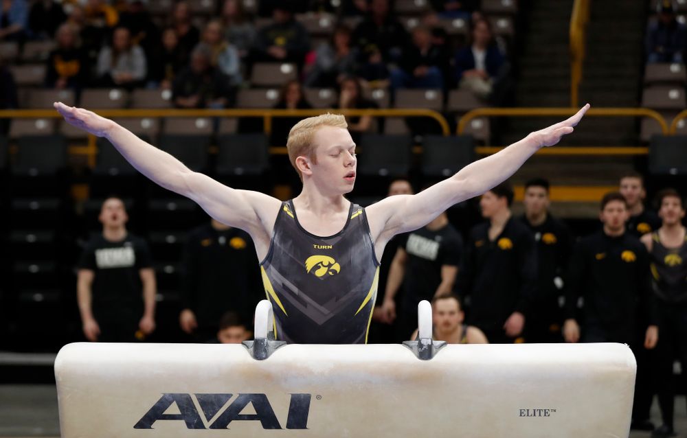 Nick Merryman competes on the pommel horse  against Minnesota and Air Force 