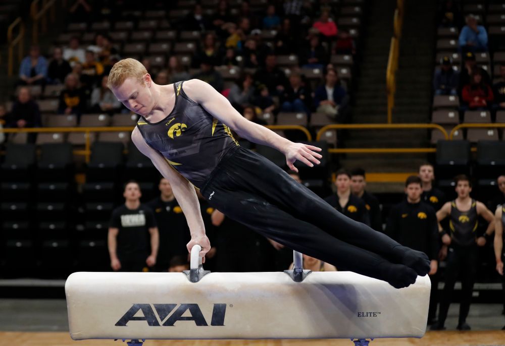 Nick Merryman competes on the pommel horse  against Minnesota and Air Force 