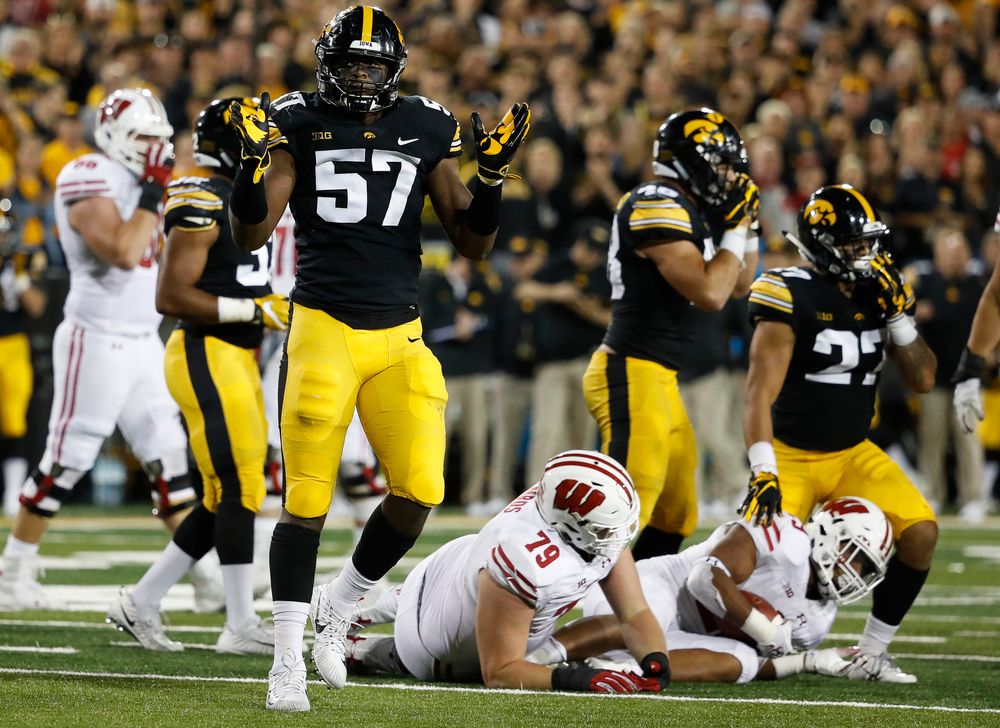 Iowa Hawkeyes defensive end Chauncey Golston (57) reacts after making a tackle during a game against Wisconsin at Kinnick Stadium on September 22, 2018. (Tork Mason/hawkeyesports.com)