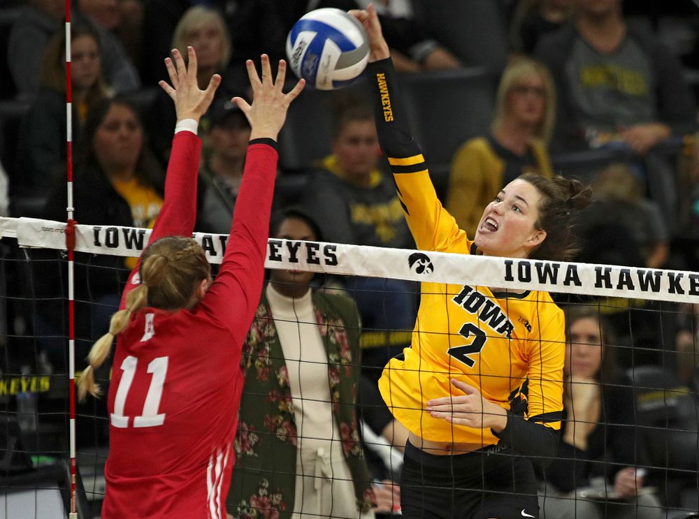 Iowa’s Courtney Buzzerio (2) lines up a shot during their match at Carver-Hawkeye Arena in Iowa City on Sunday, Oct 20, 2019. (Stephen Mally/hawkeyesports.com)