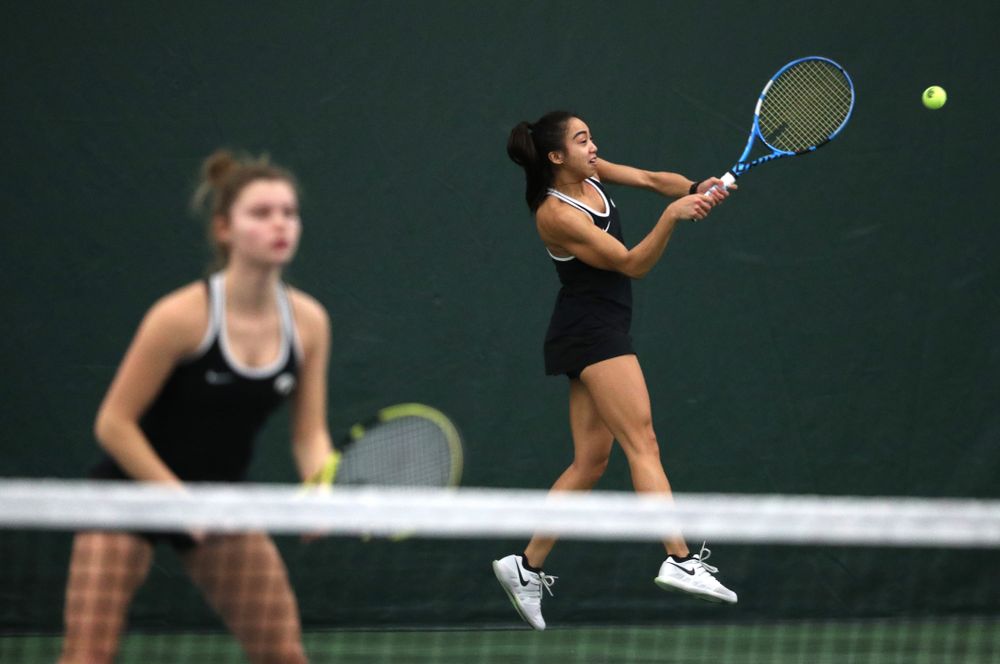Iowa's Michelle Bacalla and Cloe Ruettte play a doubles match against the Penn State Nittany Lions Sunday, February 24, 2019 at the Hawkeye Tennis and Recreation Complex. (Brian Ray/hawkeyesports.com)