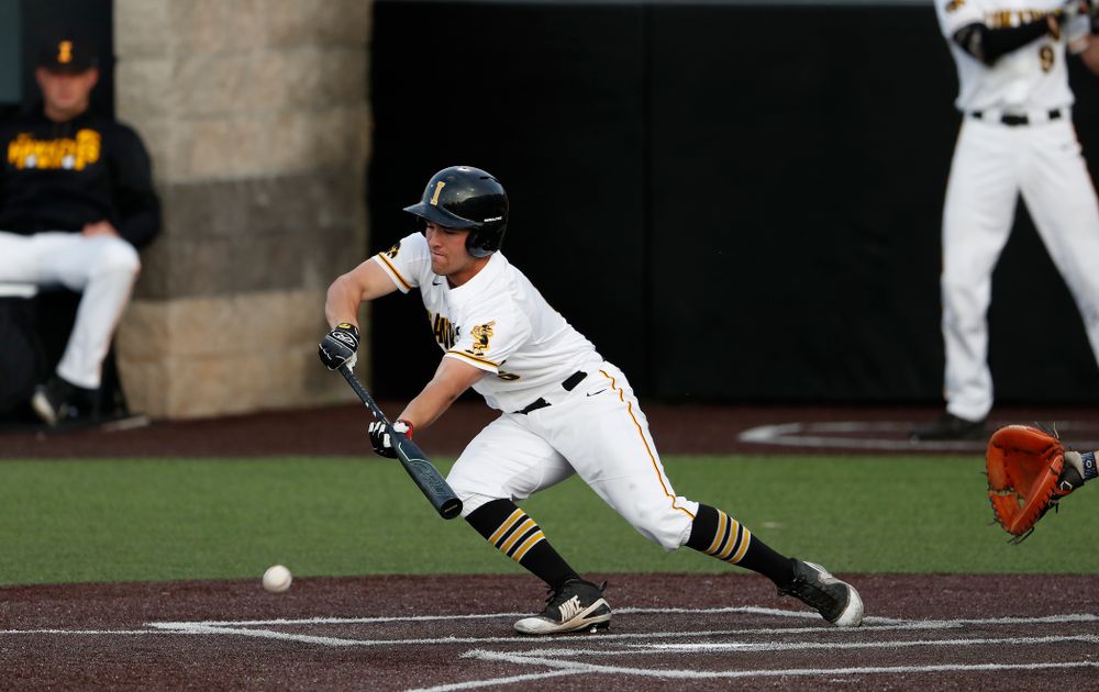 Iowa Hawkeyes outfielder Justin Jenkins (6) puts down a bunt against the Penn State Nittany Lions  Thursday, May 17, 2018 at Duane Banks Field. (Brian Ray/hawkeyesports.com)