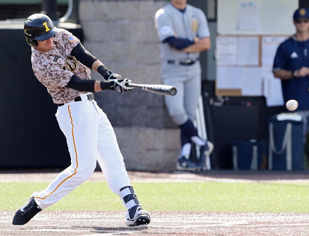 Iowa Hawkeyes shortstop Tanner Wetrich (16) hits an RBI single during the eighth inning of their game against UC Irvine at Duane Banks Field in Iowa City on Sunday, May. 5, 2019. (Stephen Mally/hawkeyesports.com)