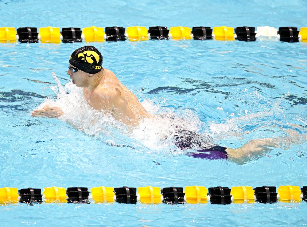 Iowa’s Aleksey Tarasenko swims the men’s 100 yard individual medley event during their meet at the Campus Recreation and Wellness Center in Iowa City on Friday, February 7, 2020. (Stephen Mally/hawkeyesports.com)