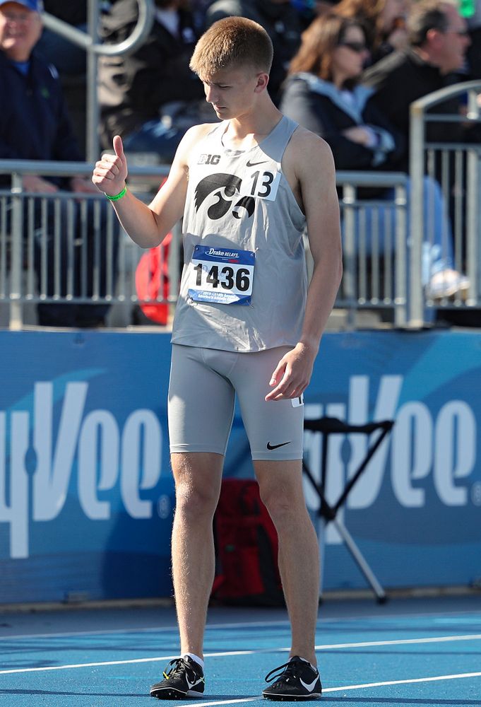 Iowa's Tyler Olson gives a thumbs up to someone in the crowd before the men's 800 meter event during the first day of the Drake Relays at Drake Stadium in Des Moines on Thursday, Apr. 25, 2019. (Stephen Mally/hawkeyesports.com)