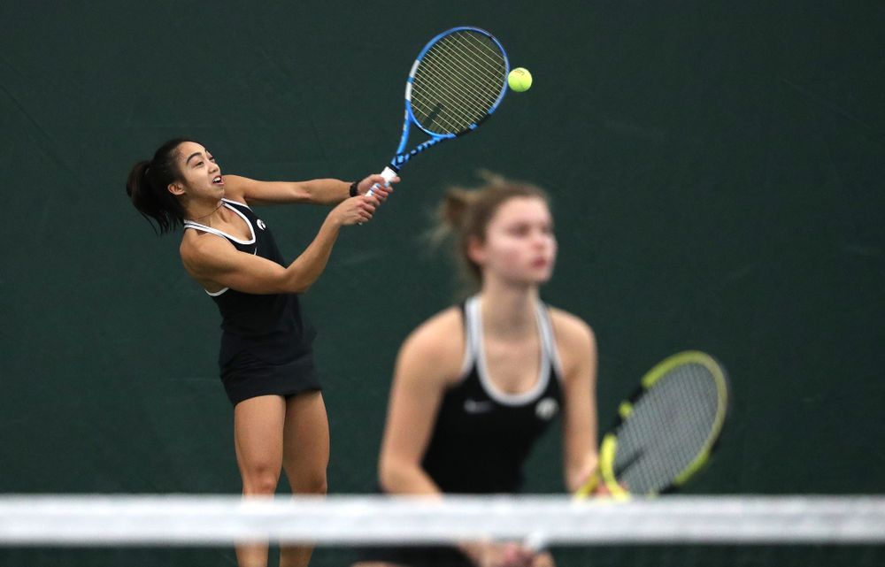 Iowa's Michelle Bacalla and Cloe Ruettte play a doubles match against the Penn State Nittany Lions Sunday, February 24, 2019 at the Hawkeye Tennis and Recreation Complex. (Brian Ray/hawkeyesports.com)
